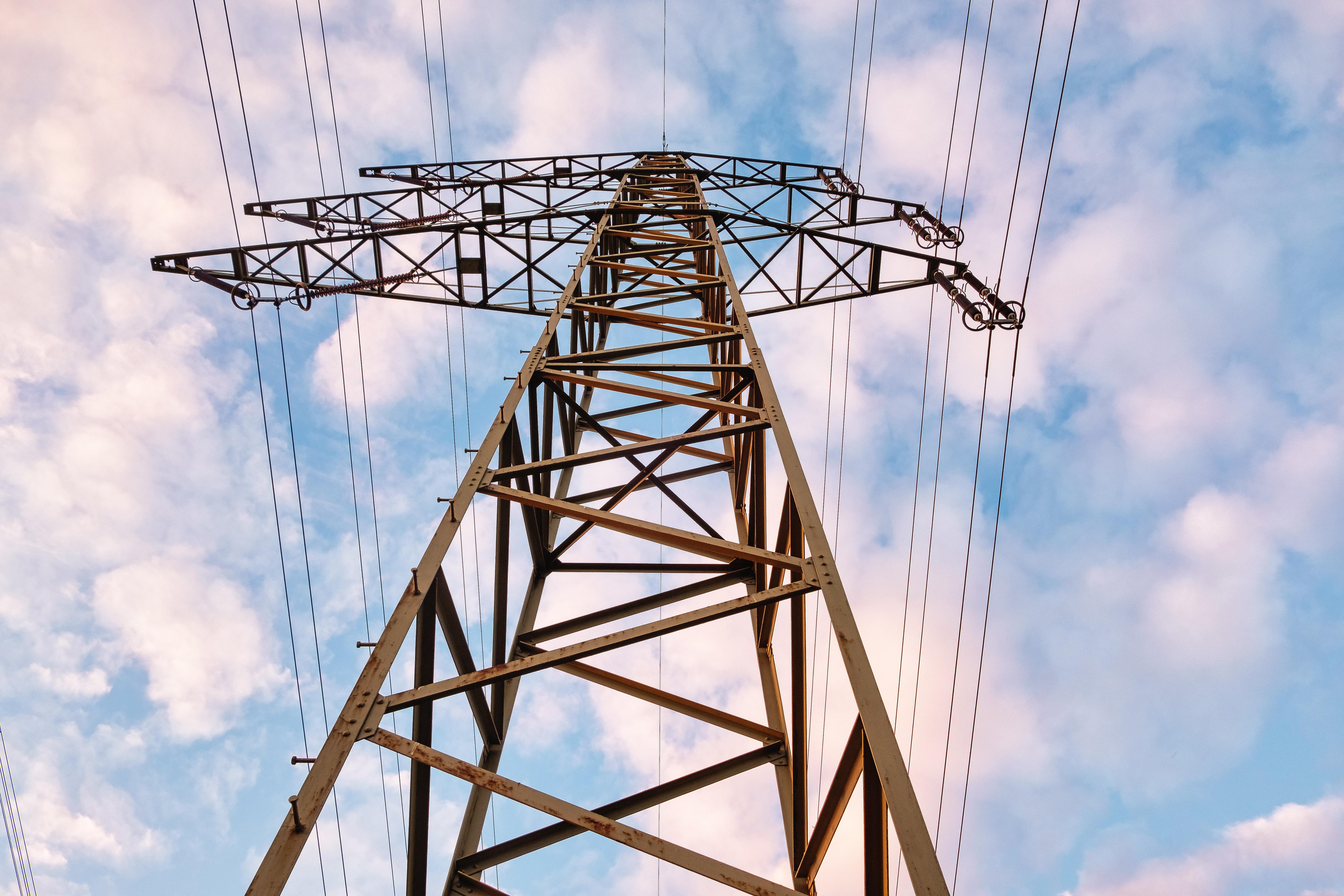 Power transmission tower against a dramatic sky